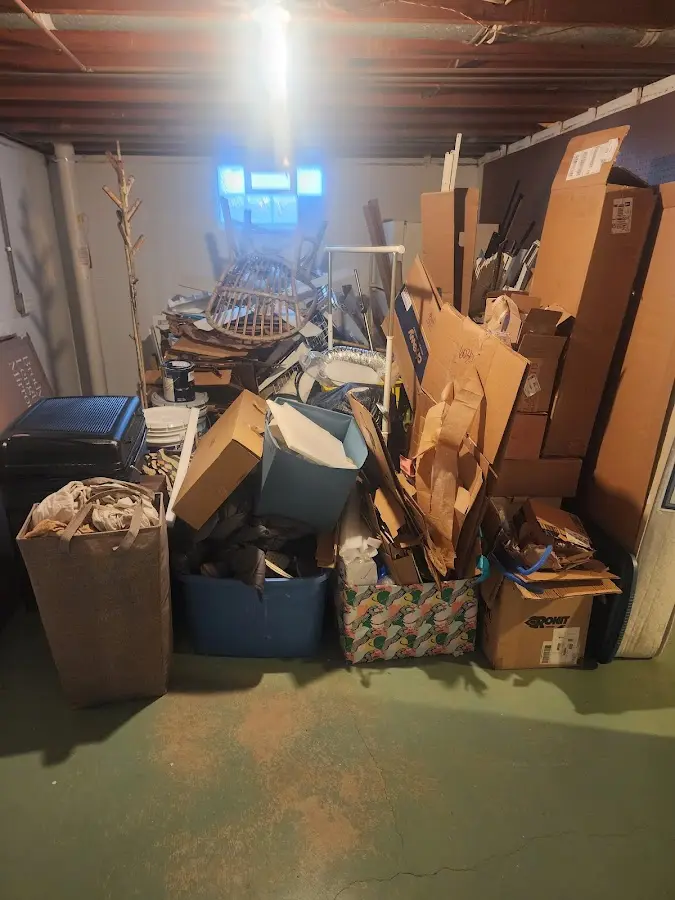 Roll-off dumpster container at job site for Construction Dumpster Rental in Sloan